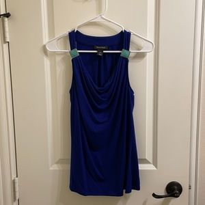 White House Black Market blue sleeveless blouse.